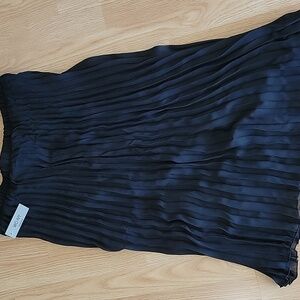 Pleated skirt with slip